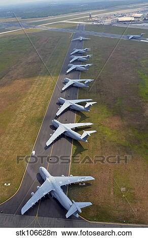 C-5 Galaxies align on the runway. View Large Photo Image Picture - C-5 Galaxies align on the runway.. Fotosearch