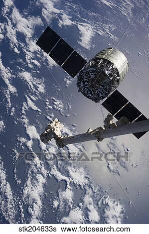 Canadarm2 robotic arm releases the Cygnus spacecraft. View Large Photo Image Stock Photograph - Canadarm2 robotic arm releases the Cygnus spacecraft.. Fotosearch