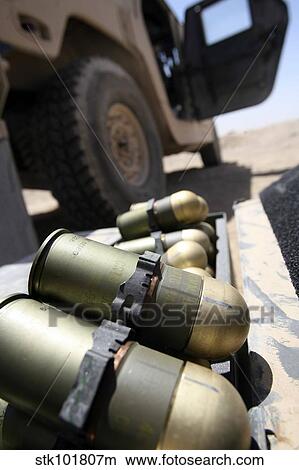 Picture - Cans of opened 40 mm grenades.. Fotosearch