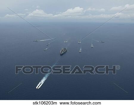 Carrier Strike Group formation of ships in the Bay of Bengal. View Large Photo Image Picture - Carrier Strike Group formation of ships in the Bay of Bengal.. Fotosearch