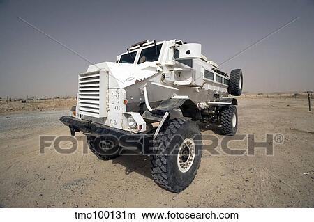 Casper armored vehicle sits outside the wire at the entrance to Al Asad Marine Camp. View Large Photo Image Picture - Casper armored vehicle sits outside the wire at the entrance to Al Asad Marine Camp.. Fotosearch