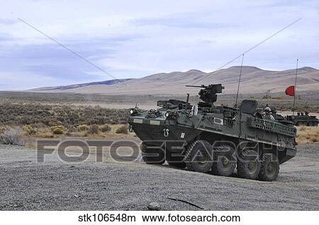 Picture - Cavalry troopers fire the Stryker-mounted M2. 50-caliber machine gun.. Fotosearch