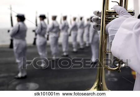 Ceremonial Honor Guard members stand at port arms during a burial at sea ceremony. View Large Photo Image Picture - Ceremonial Honor Guard members stand at port arms during a burial at sea ceremony.. Fotosearch