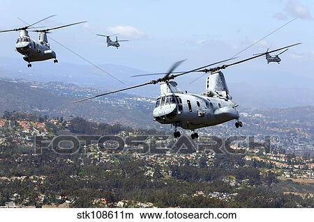 CH-46E Sea Knight helicopters fly over San Diego, California. View Large Photo Image Picture - CH-46E Sea Knight helicopters fly over San Diego, California.. Fotosearch