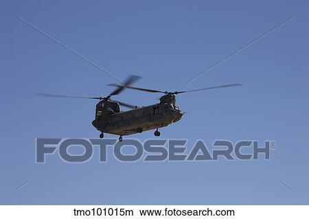 CH-47 Chinook flies over Playas Training Area, New Mexico. View Large Photo Image Picture - CH-47 Chinook flies over Playas Training Area, New Mexico.. Fotosearch