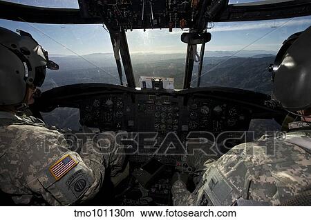 CH-47 Chinook pilots in flight over Arizona. View Large Photo Image Picture - CH-47 Chinook pilots in flight over Arizona.. Fotosearch