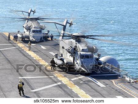 Picture - CH-53E Super Stallion helicopters prepare to take off from USS Iwo Jima.. Fotosearch