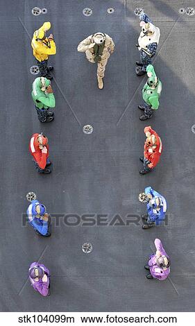 Picture - Chief of Naval Operations passes through the rainbow sideboys.. Fotosearch