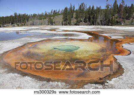 Stock Photograph - Chromatic Pool Hot Spring, Upper Geyser Basin geothermal area, Yellowstone National Park, Wyoming.. Fotosearch