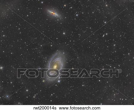 Stock Photograph - Cigar Galaxy and Bode's Galaxy in the constellation Ursa Major.. Fotosearch