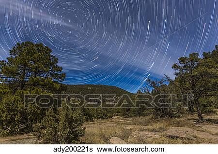 Circumpolar star trails over the Gila National Forest in southern New Mexico. View Large Photo Image Stock Photograph - Circumpolar star trails over the Gila National Forest in southern New Mexico.. Fotosearch