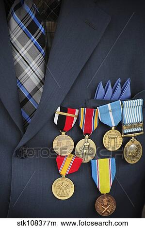 Close-up of medals and awards on the uniform of a retired U. S. Air Force veteran. View Large Photo Image Picture - Close-up of medals and awards on the uniform of a retired U. S. Air Force veteran.. Fotosearch