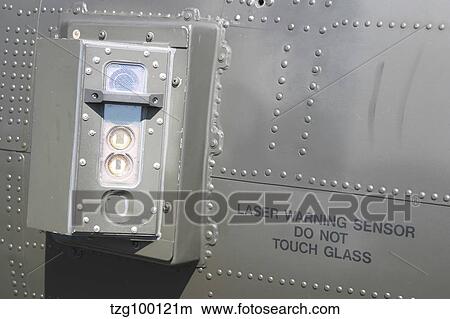Close-up of the laser warning sensor on an AH-64D Apache. View Large Photo Image Picture - Close-up of the laser warning sensor on an AH-64D Apache.. Fotosearch