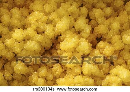 Stock Photograph - Close-up of yellow salt crystals in the Dallol geothermal area, Danakil Depression, Ethiopia.. Fotosearch