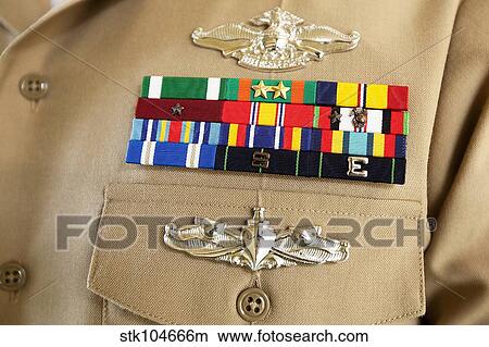 Close-up view of military decorations and honors on the uniform of a Petty Officer. View Large Photo Image Picture - Close-up view of military decorations and honors on the uniform of a Petty Officer.. Fotosearch