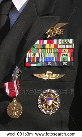 Close-up view of military decorations and honors on a commander's dress uniform. View Large Photo Image Picture - Close-up view of military decorations and honors on a commander's dress uniform.. Fotosearch