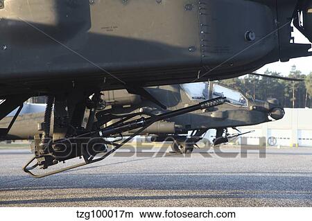 Close-up view of the M230 chain gun on an AH-64D Apache helicopter. View Large Photo Image Picture - Close-up view of the M230 chain gun on an AH-64D Apache helicopter.. Fotosearch