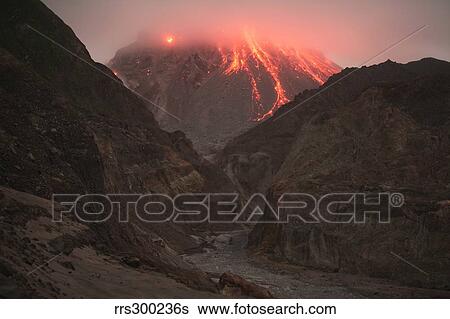 Stock Photograph - Cloud-capped lava dome of Soufriere Hills volcano, Tar River Valley, Montserrat, Caribbean.. Fotosearch