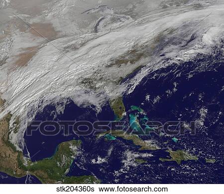 Stock Photograph - Cloud coverage over the United States and Atlantic Ocean.. Fotosearch