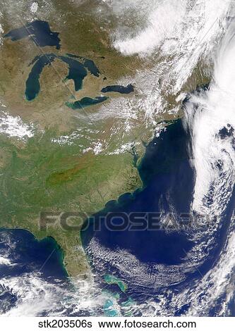 Stock Photograph - Cloud-free weather over much of the eastern United States.. Fotosearch