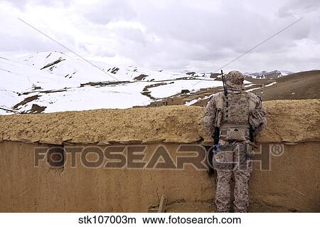 Coalition forces visit the Hazaran village in Afghanistan. View Large Photo Image Picture - Coalition forces visit the Hazaran village in Afghanistan.. Fotosearch