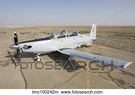 COB Speicher, Tikrit, Iraq - A T-6 Texan trainer aircraft of the Iraqi Air Force. View Large Photo Image Picture - COB Speicher, Tikrit, Iraq - A T-6 Texan trainer aircraft of the Iraqi Air Force.. Fotosearch