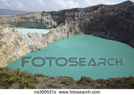 Colourful crater lakes of Kelimutu volcano, Flores Island, Indonesia. View Large Photo Image Stock Photograph - Colourful crater lakes of Kelimutu volcano, Flores Island, Indonesia.. Fotosearch