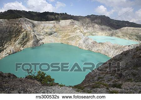 Colourful crater lakes of Kelimutu volcano, Flores Island, Indonesia. View Large Photo Image Stock Photograph - Colourful crater lakes of Kelimutu volcano, Flores Island, Indonesia.. Fotosearch