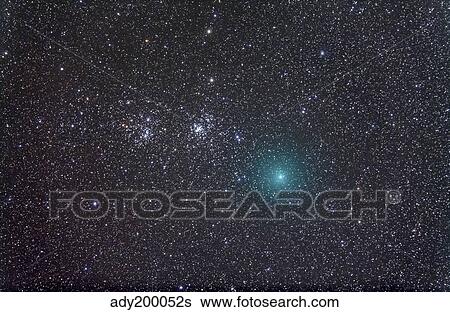 Comet Hartley 2 as it approaches the Double Cluster in Perseus. View Large Photo Image Stock Photograph - Comet Hartley 2 as it approaches the Double Cluster in Perseus.. Fotosearch