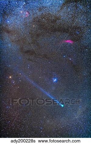 Stock Photograph - Comet Lovejoy's long ion tail in Taurus.. Fotosearch
