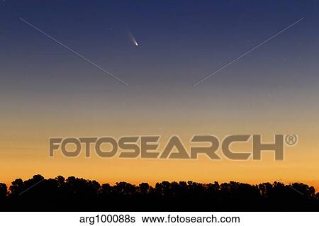 Stock Photograph - Comet Panstarrs at twilight, Buenos Aires, Argentina.. Fotosearch