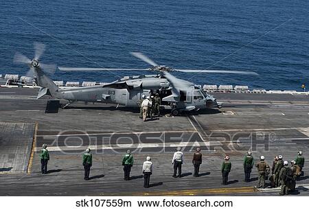 Commander of Naval Air Forces arrives aboard USS Carl Vinson. View Large Photo Image Picture - Commander of Naval Air Forces arrives aboard USS Carl Vinson.. Fotosearch