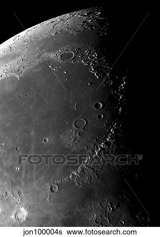 Stock Photograph - Craters Copernicus, Plato, Eratosthenes, and Archimedes near the Montes Apenninus mountain range.. Fotosearch