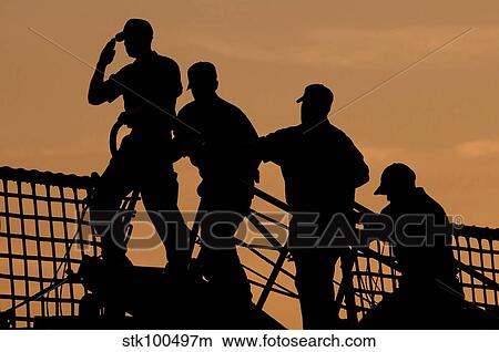 Crewmen salute the American flag before coming aboard the USCGC Campbell. View Large Photo Image Picture - Crewmen salute the American flag before coming aboard the USCGC Campbell.. Fotosearch