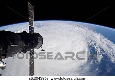 Cyclone Glenda and a docked Soyuz spacecraft. View Large Photo Image Stock Photograph - Cyclone Glenda and a docked Soyuz spacecraft.. Fotosearch