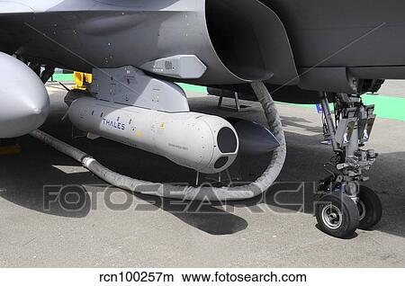Damocles targeting pod mounted on a French Air Force Rafale fighter plane. View Large Photo Image Picture - Damocles targeting pod mounted on a French Air Force Rafale fighter plane.. Fotosearch