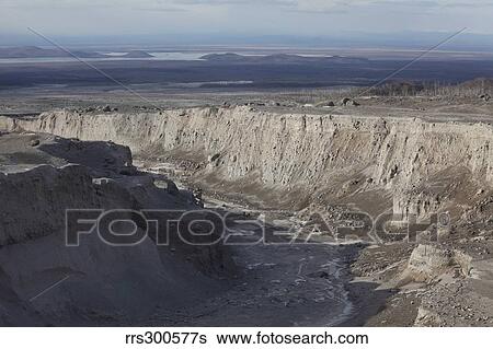 Deep erosion gulley in eroded pyroclastic flow deposits, Shiveluch Volcano. View Large Photo Image Stock Photograph - Deep erosion gulley in eroded pyroclastic flow deposits, Shiveluch Volcano.. Fotosearch