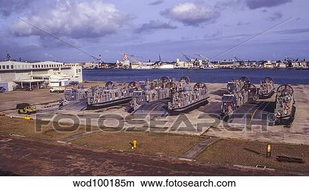 Deflated Landing Craft Air Cushion vehicles in Pearl Harbor, Hawaii. View Large Photo Image Picture - Deflated Landing Craft Air Cushion vehicles in Pearl Harbor, Hawaii.. Fotosearch
