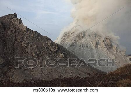 Degassing Rerombola lava dome of Paluweh volcano, Indonesia. View Large Photo Image Stock Photograph - Degassing Rerombola lava dome of Paluweh volcano, Indonesia.. Fotosearch