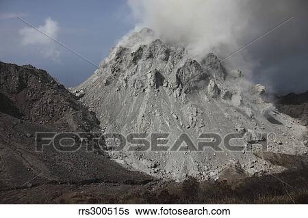 Degassing Rerombola lava dome of Paluweh volcano, Indonesia. View Large Photo Image Stock Photograph - Degassing Rerombola lava dome of Paluweh volcano, Indonesia.. Fotosearch
