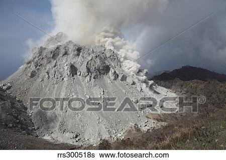 Degassing Rerombola lava dome of Paluweh volcano, Indonesia. View Large Photo Image Stock Photograph - Degassing Rerombola lava dome of Paluweh volcano, Indonesia.. Fotosearch