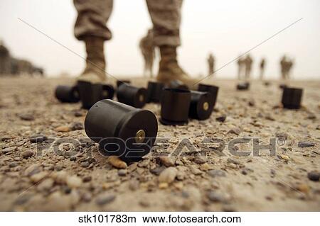 Dented primers and empty shells of the M-32 Multiple Shot Grenade Launcher. View Large Photo Image Picture - Dented primers and empty shells of the M-32 Multiple Shot Grenade Launcher.. Fotosearch