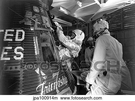 Digitally restored photo of astronaut John Glenn entering the Friendship 7 spacecraft. View Large Photo Image Picture - Digitally restored photo of astronaut John Glenn entering the Friendship 7 spacecraft.. Fotosearch