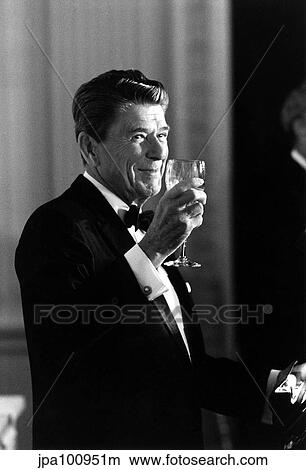Picture - Digitally restored photo of President Ronald Reagan making a toast.. Fotosearch