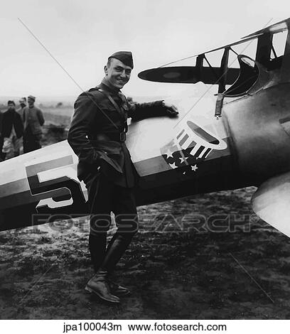 Digitally restored vector artwork of Eddie Rickenbacker standing next his fighter plane. View Large Photo Image Picture - Digitally restored vector artwork of Eddie Rickenbacker standing next his fighter plane.. Fotosearch
