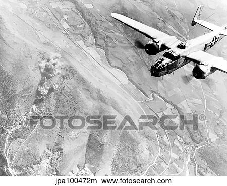 Digitally restored vector photograph of a B-25 bomber during WWII. View Large Photo Image Picture - Digitally restored vector photograph of a B-25 bomber during WWII.. Fotosearch