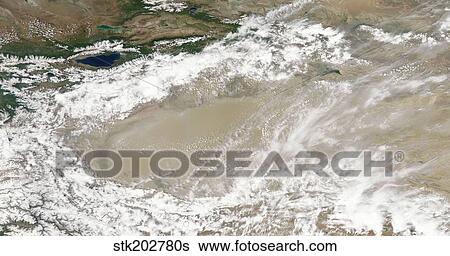 Dust and clouds hovered over the Taklimakan Desert. View Large Photo Image Stock Photograph - Dust and clouds hovered over the Taklimakan Desert.. Fotosearch