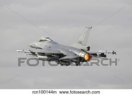 Dutch Air Force F-16AM taking off with full afterburner. View Large Photo Image Picture - Dutch Air Force F-16AM taking off with full afterburner.. Fotosearch