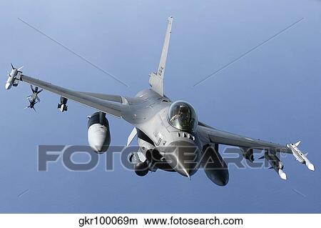 Dutch F-16AM during a combat air patrol sortie over the Mediterranean Sea. View Large Photo Image Picture - Dutch F-16AM during a combat air patrol sortie over the Mediterranean Sea.. Fotosearch