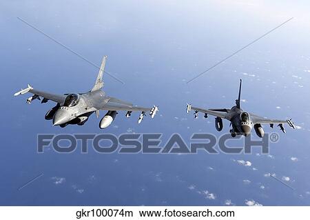 Dutch F-16AMs during a combat air patrol sortie over the Mediterranean Sea. View Large Photo Image Picture - Dutch F-16AMs during a combat air patrol sortie over the Mediterranean Sea.. Fotosearch